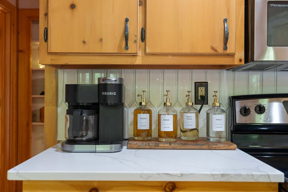 Enjoy the Keurig machine and Torani coffee bar for your morning cup of coffee... tea and an electric kettle also provided. 