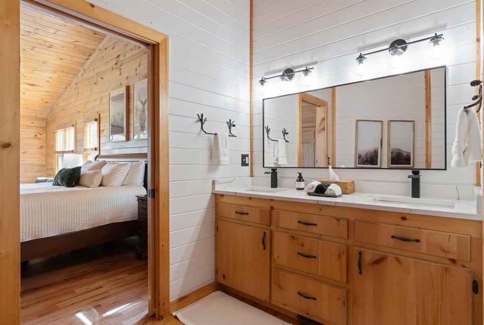 Spa like bathroom in master bedroom provides plenty space for getting ready to explore Blue Ridge. 