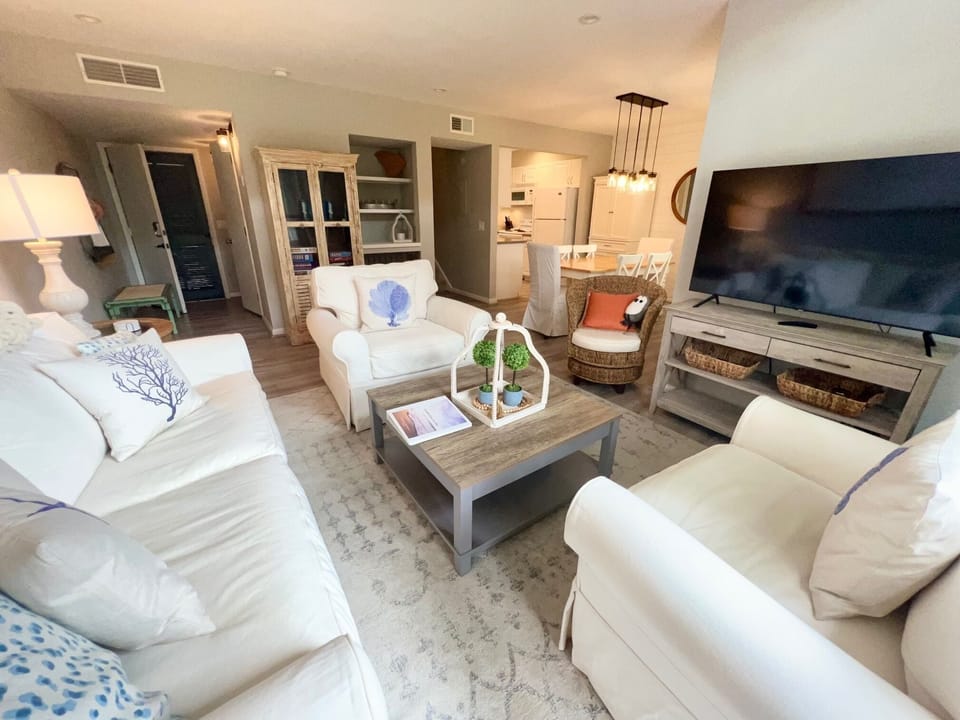 The bright, open living room.