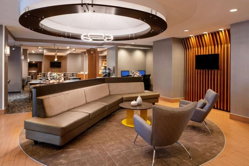 Unwind in the modern lobby lounge before heading out.