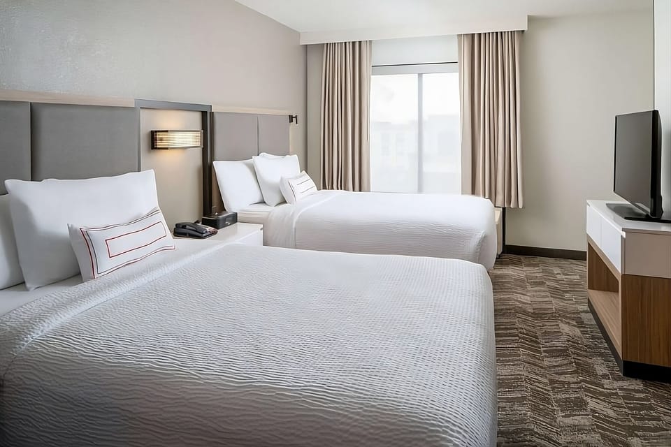 Unwind in bright double beds for restful nights together.