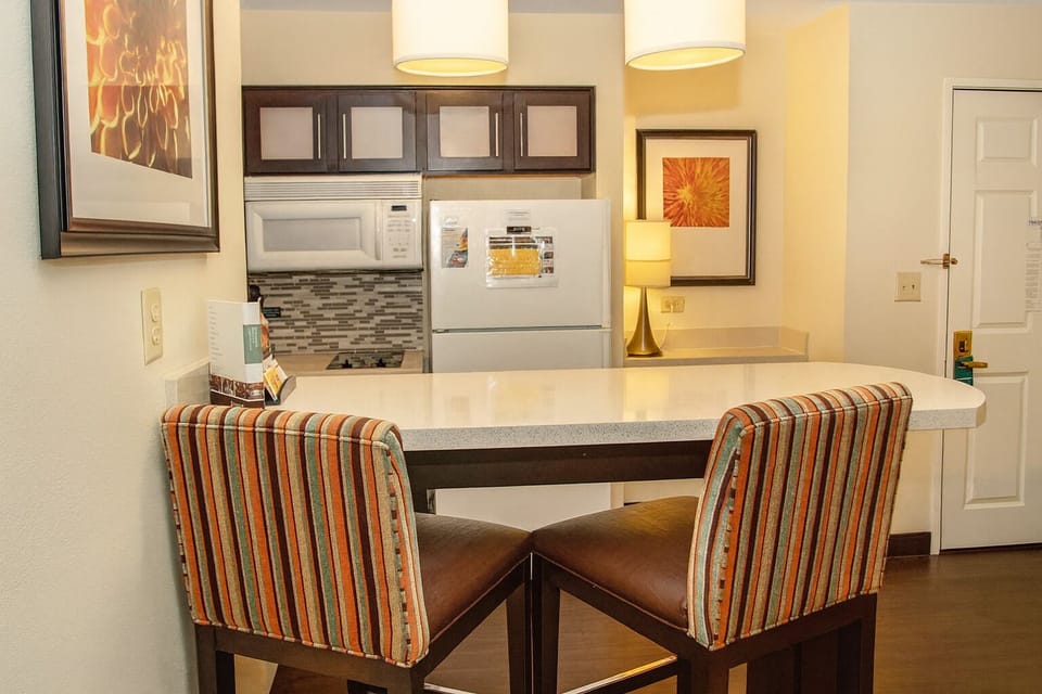 Start mornings with coffee at the bright breakfast bar.
