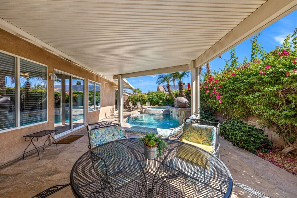 Outdoor dining area in the shaded patio area