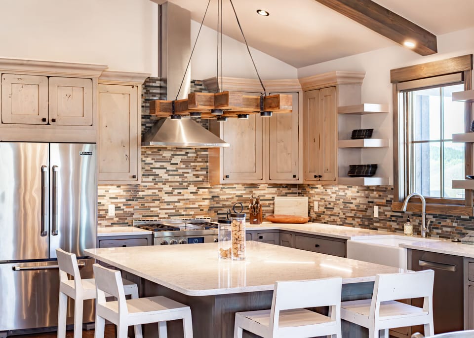 Fully stocked kitchen with modern finishes, ready for you to use