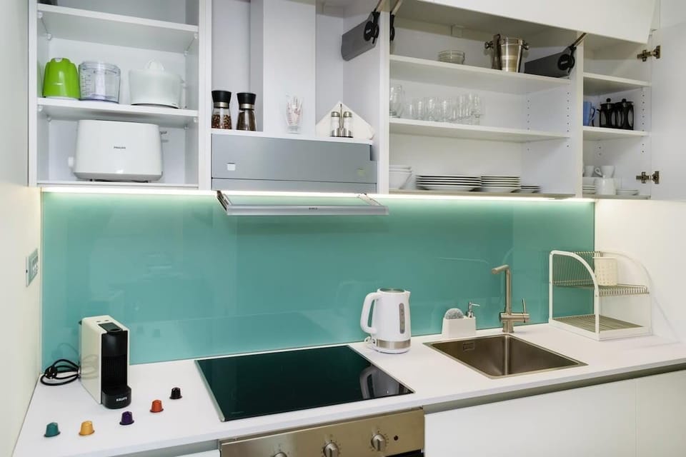 Fully equipped kitchen with nespresso machine.