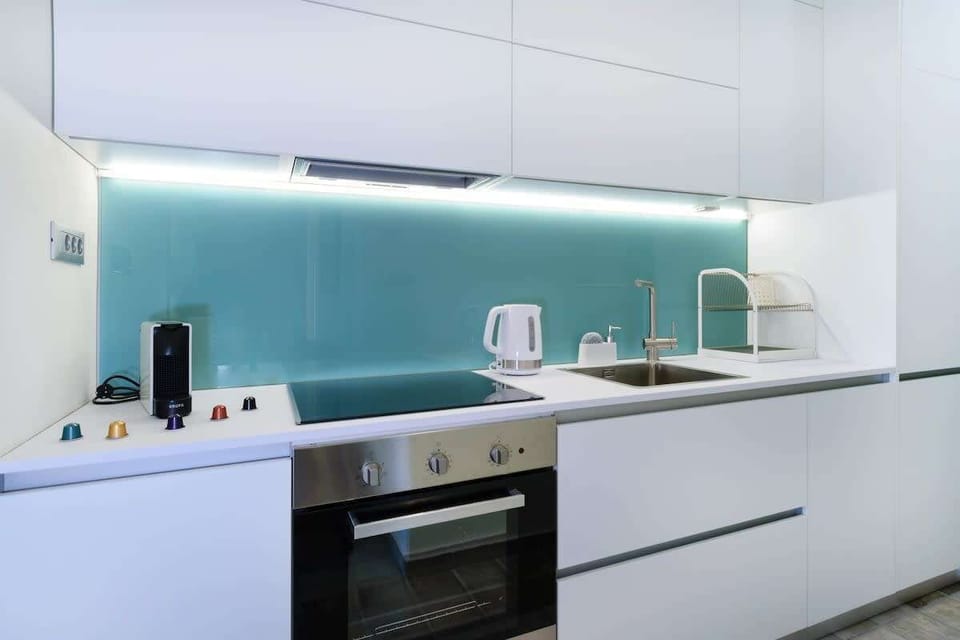 Fully equipped kitchen with nespresso machine.