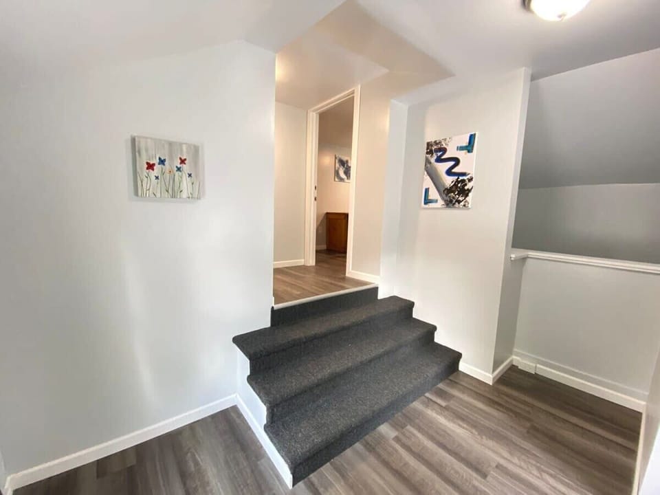 Just a few more steps up to the other bedrooms and another full bathroom.