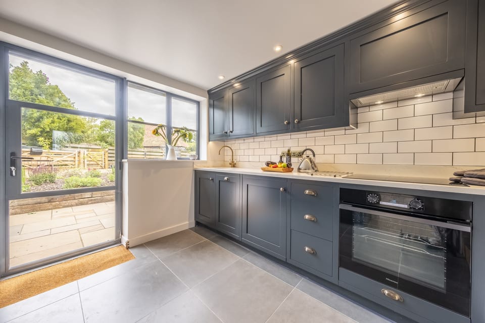 Ground floor: Modern kitchen with garden views
