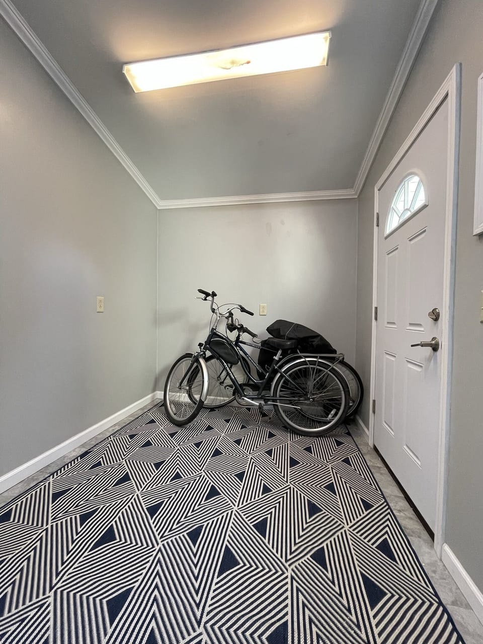 "Extra" Room with bicycles
door on right leads to enclosed patio