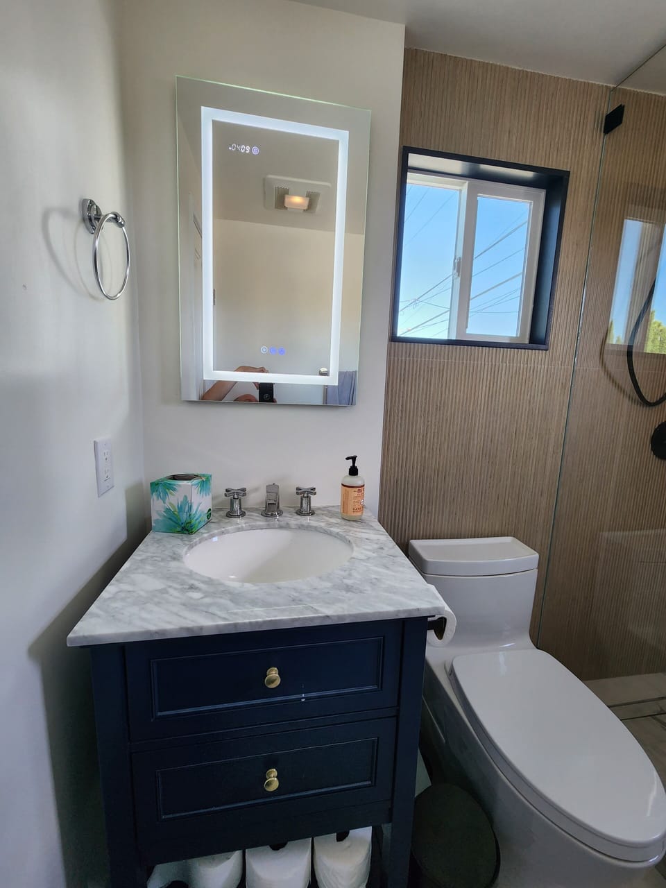 bathroom with heated makeup mirror, medicine cabinet