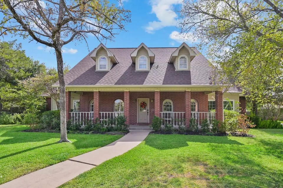 6 vehicle parking in driveway plus front of home , large porch