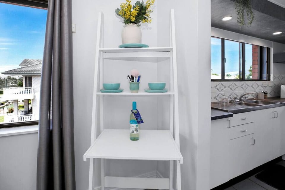 Kitchen Nook: Bright space with fresh decor, ready for your culinary adventures or morning coffee!