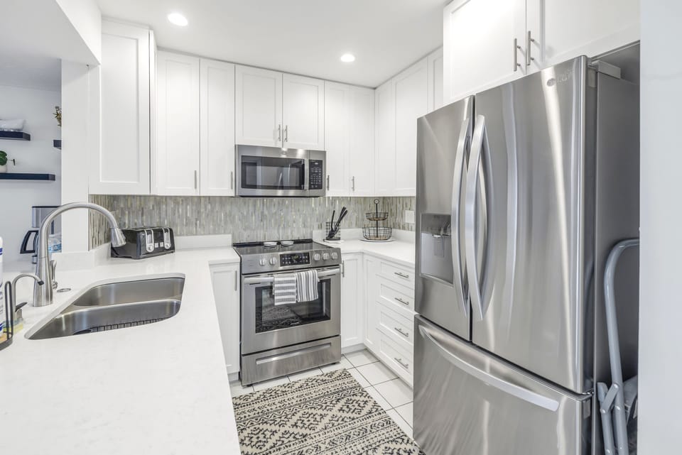 Plenty of counter space and full-sized fridge.