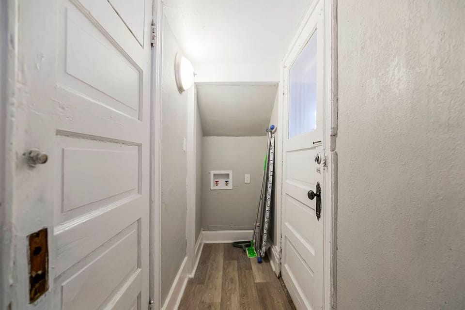 A combo washer/dryer will be installed in the unit prior to occupancy. This is the second exit and easiest way to run dogs to the yard.
