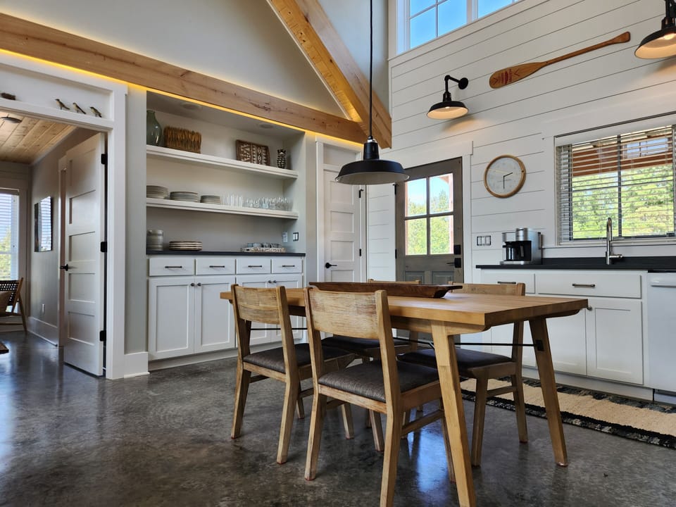 Dining table for four inside.
Table for six on the back porch.