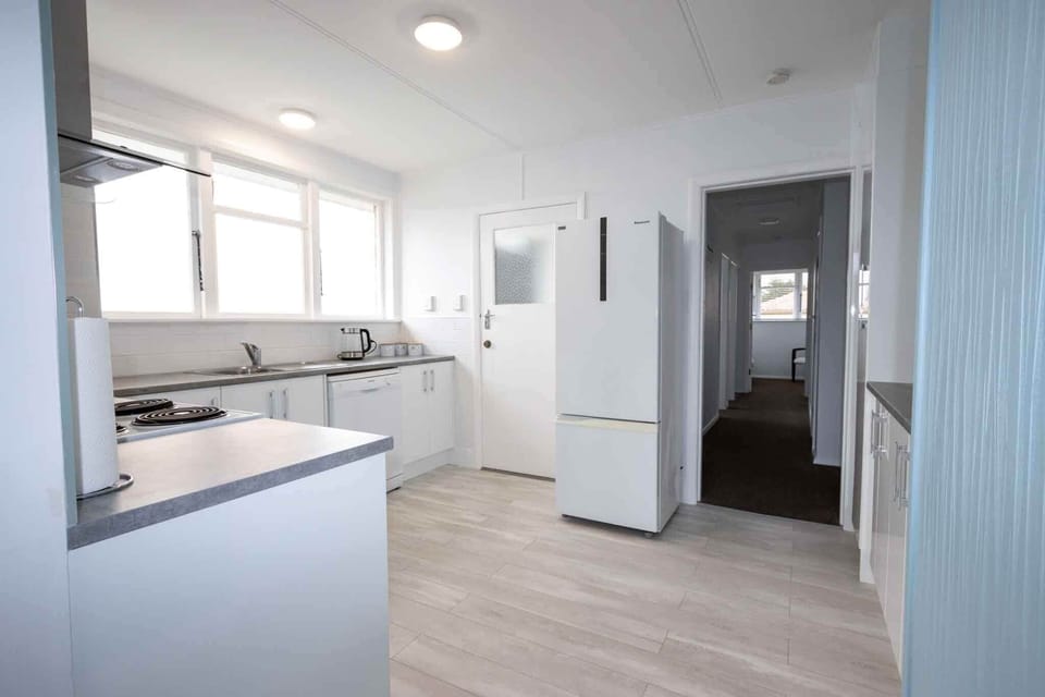 New kitchen with stove, microwave, dishwasher, fridge/freezer