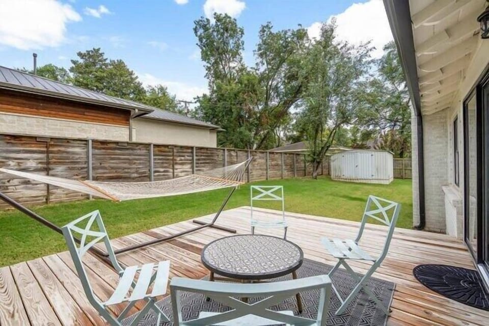 Nice seating area on the back deck with a gigantic hammock for your comfort.