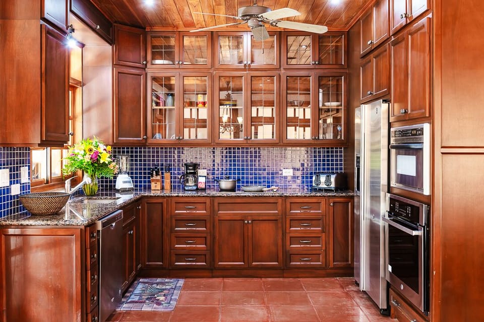 Fully equipped modern kitchen at the Langosta Beach villa in Tamarindo, featuring top appliances, ample counter space, and an open layout. Perfect for preparing meals while enjoying a luxury Costa Rica vacation.