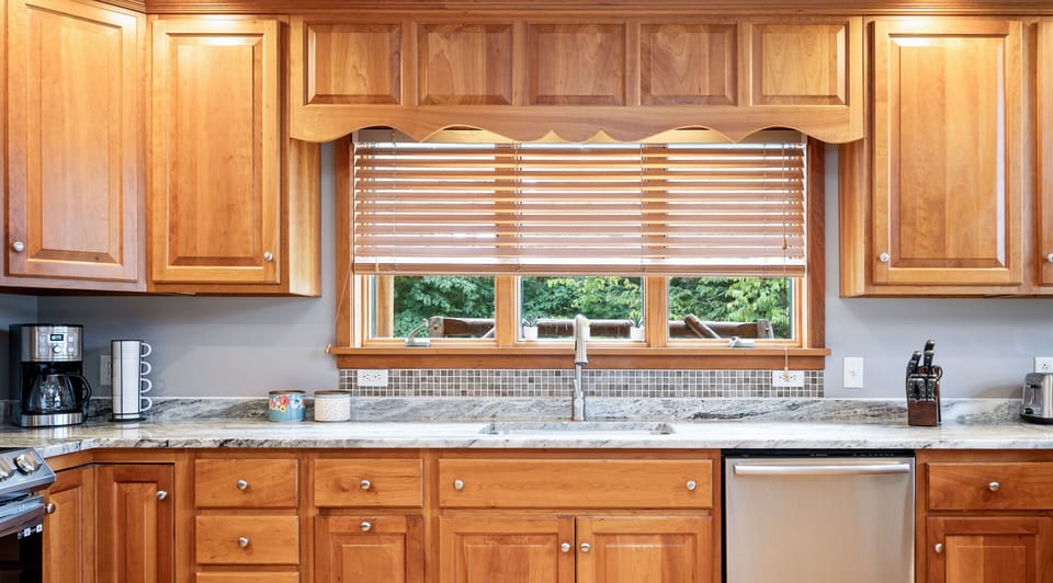 Window overlooking the side deck. Dishwasher helps make clean up a breeze so you can enjoy more time relaxing or adventuring