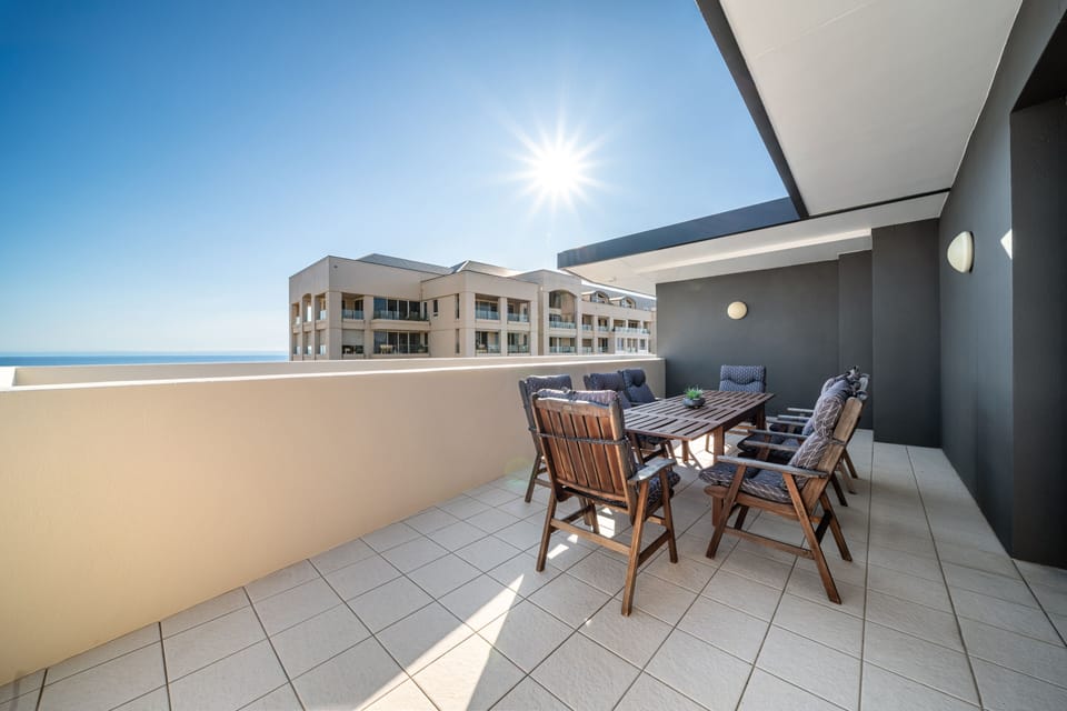 Large Balcony with sea and park views at Glenelg Seaview Pentouse Accomodation.