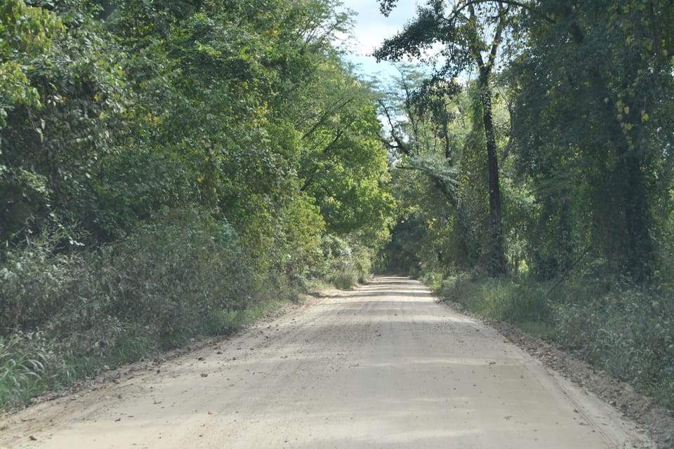 Beautiful gravel road drive about 4 miles to public boat launch
