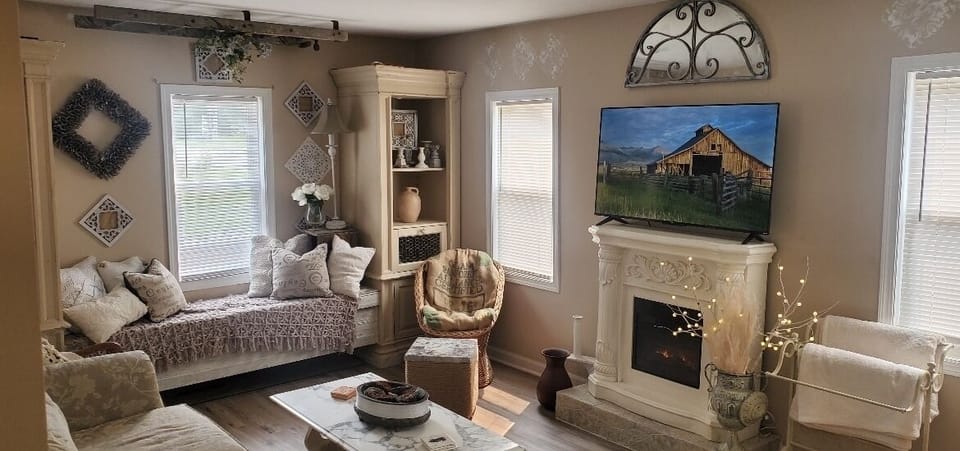This is the cozy living room. It flows from the dining room. 