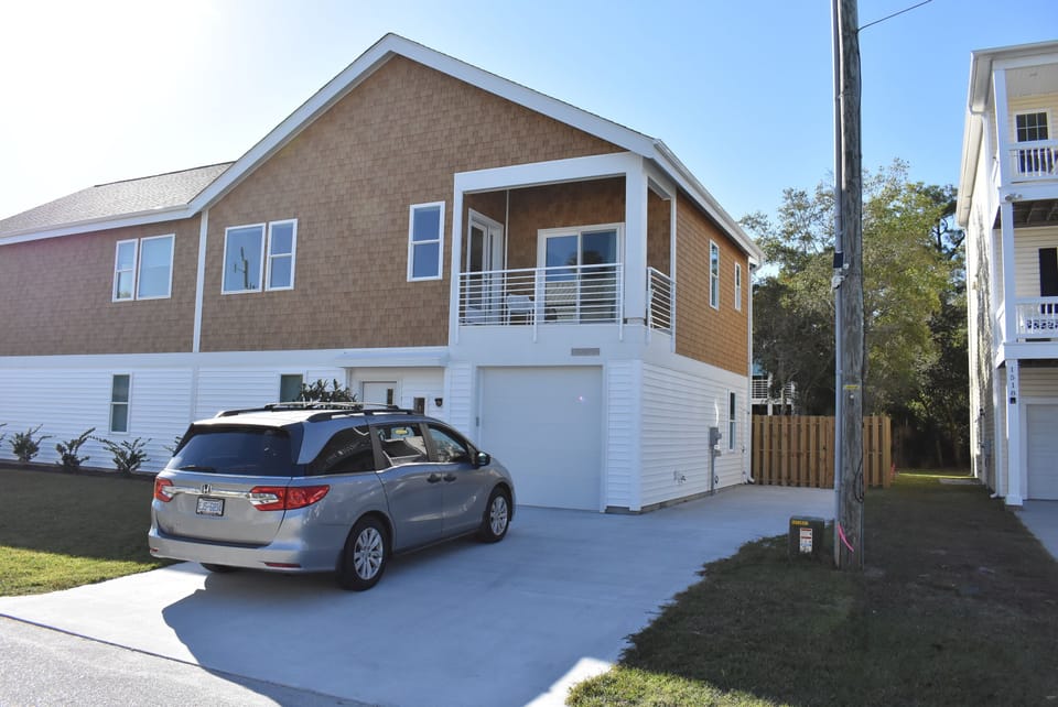 Exterior, one car garage, large driveway