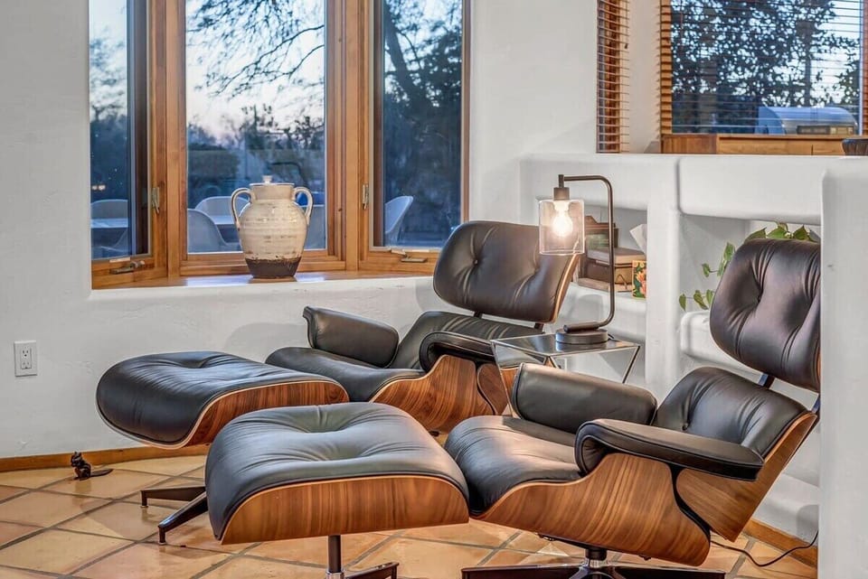 Our Eames lounge chairs offer a touch of mid-century modern flair – perfect for kicking back and enjoying a moment of serenity.