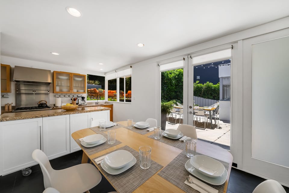 Dining area with doors to the yard / outdoor BBQ and dining area