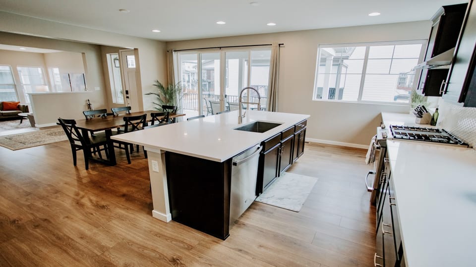 Open Floor Concept: Seamlessly Connected Spaces for a Spacious Feel.