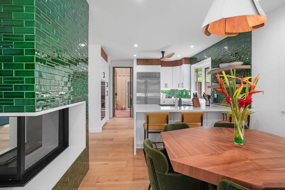 Kitchen dining area and fireplace.  