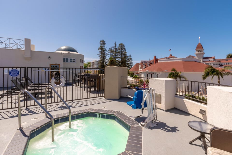 Enjoy a private rooftop soak with charming neighborhood vistas.