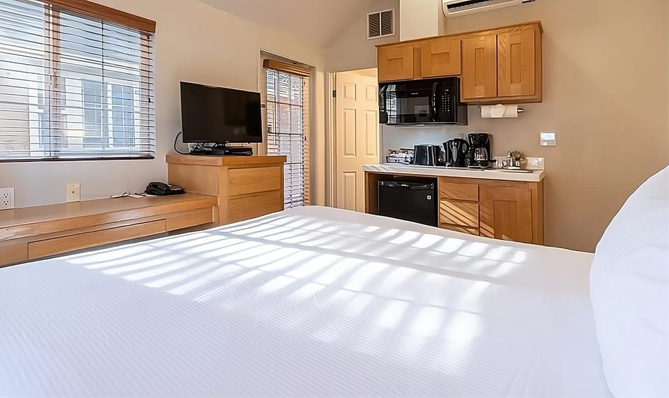Wake up to easy mornings with kitchenette essentials steps away.