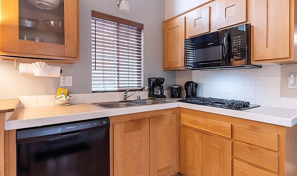 Cook with ease in a bright kitchen with full-size range.