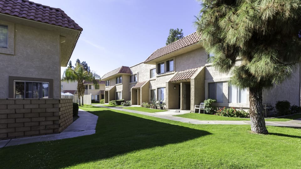 Arrive with ease along quiet paths and manicured lawns.