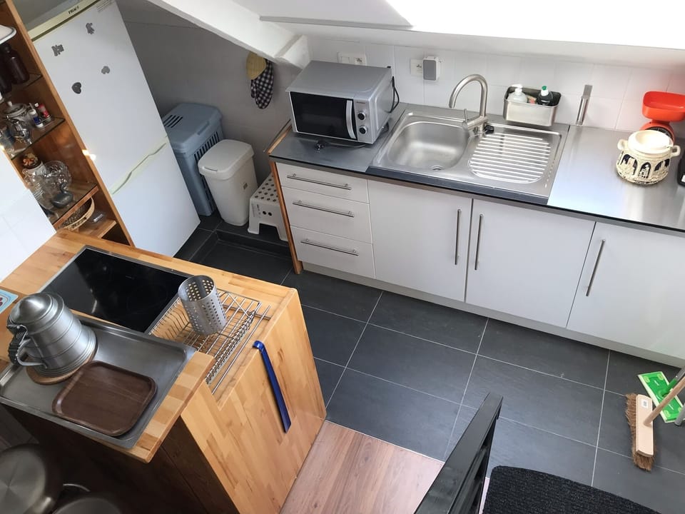 overview of the kitchen  of suite 4