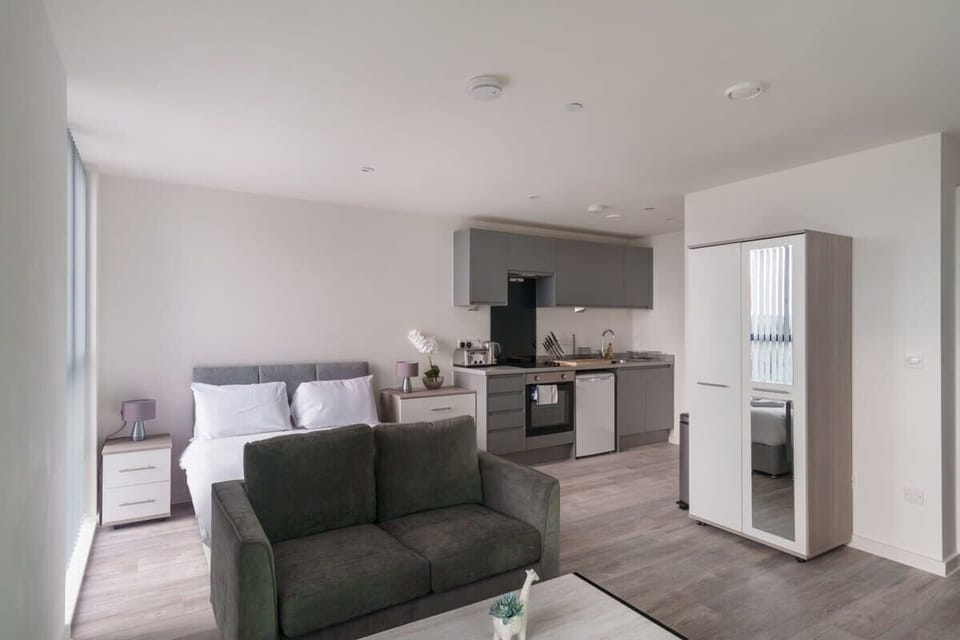 Ample storage space with a mirrored wardrobe and dedicated utility bins, ensuring your living space stays clean and organized throughout your stay.