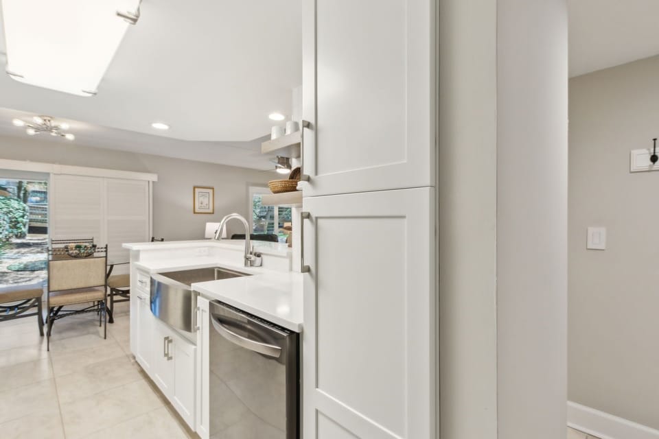 Fully Renovated Kitchen with Open Shelving, Gorgeous Quartz Countertops, and Stainless Steel Appliances