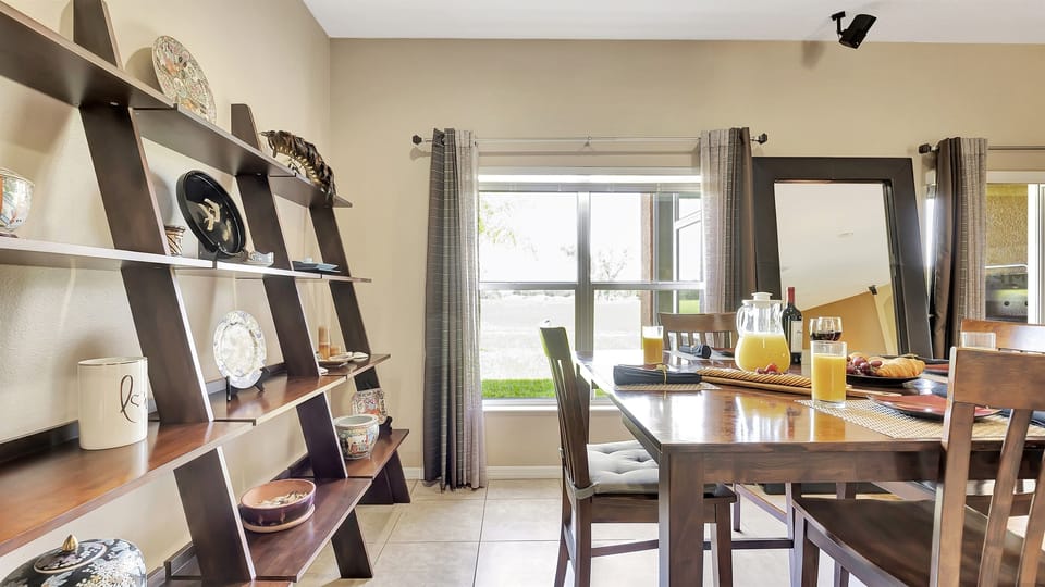 As you savor your culinary creations, bask in the abundant natural light that floods the room, creating an enchanting ambiance for your dining pleasure.