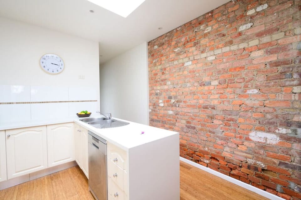A convenient sink for easy clean-up and cabinets to provide extra storage.