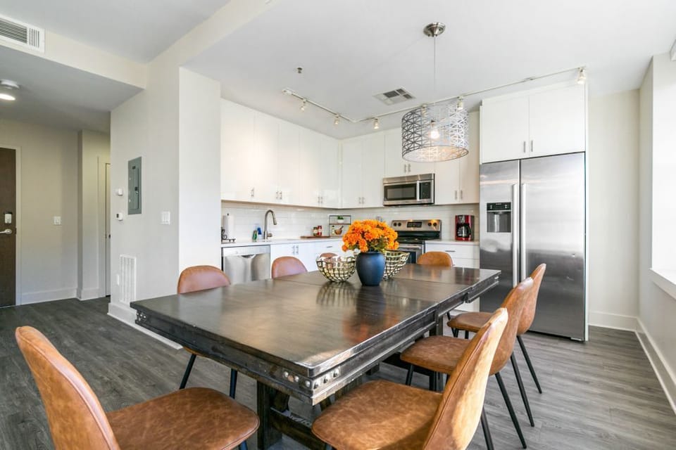 Large dining table — great for family meals or group gatherings.