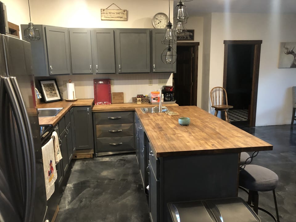 Spacious kitchen with seating for 4 at island. Huge fridge with lower freezer.