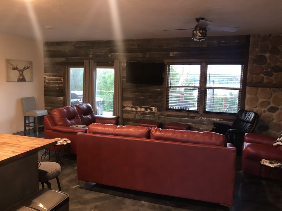 Comfy & cozy living room with beautiful view of the lake.