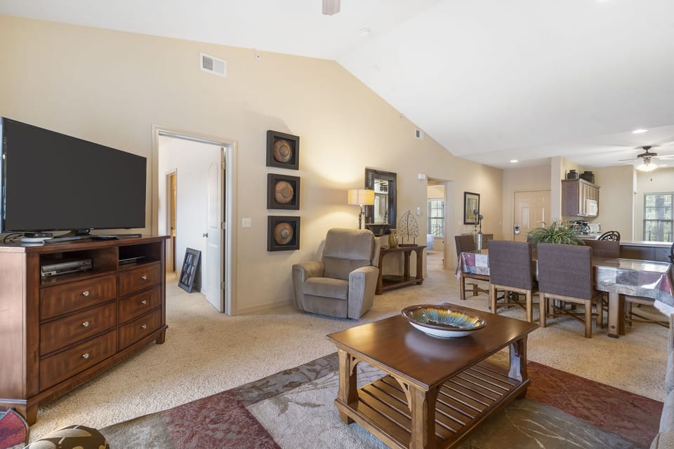 Living Area with Patio Access, Cable TV, and Queen Sleeper Sofa