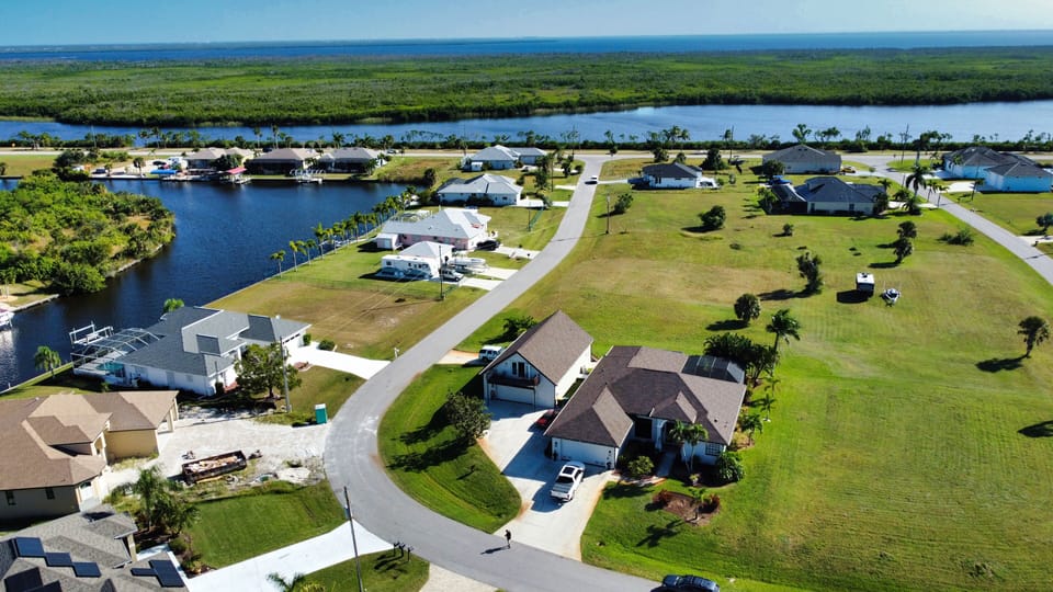 Arial view of home showing nearby waterways with access to Gulf.  