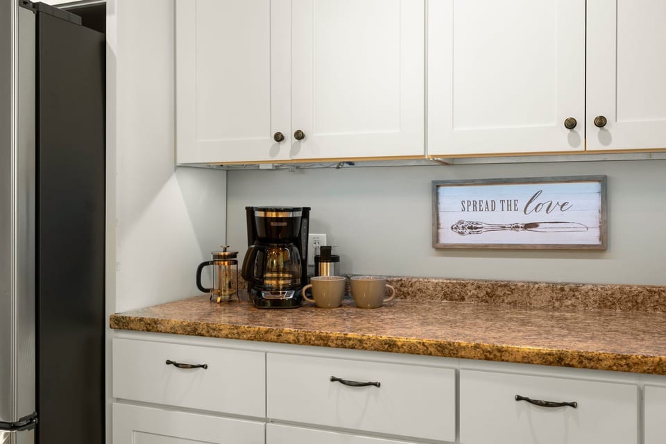 Regular & decaf coffee & tea provided along with drip coffee pot & french press