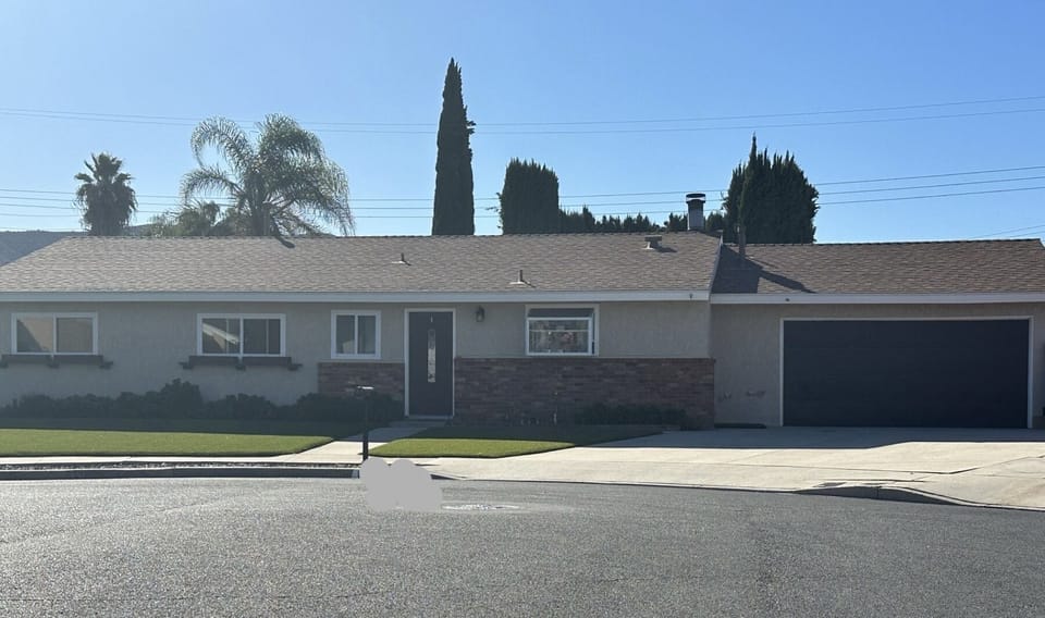 Double driveway for parking, front of house.  