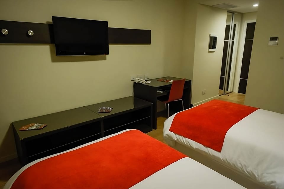 Work comfortably at the desk, then unwind with TV.