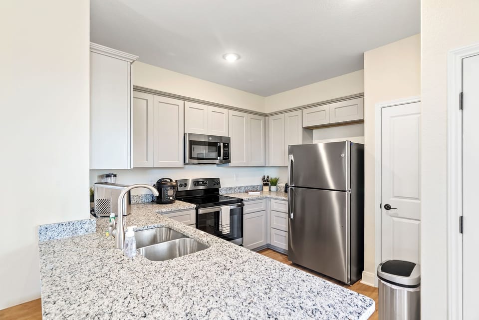 Plenty of workspace on the new granite countertops.