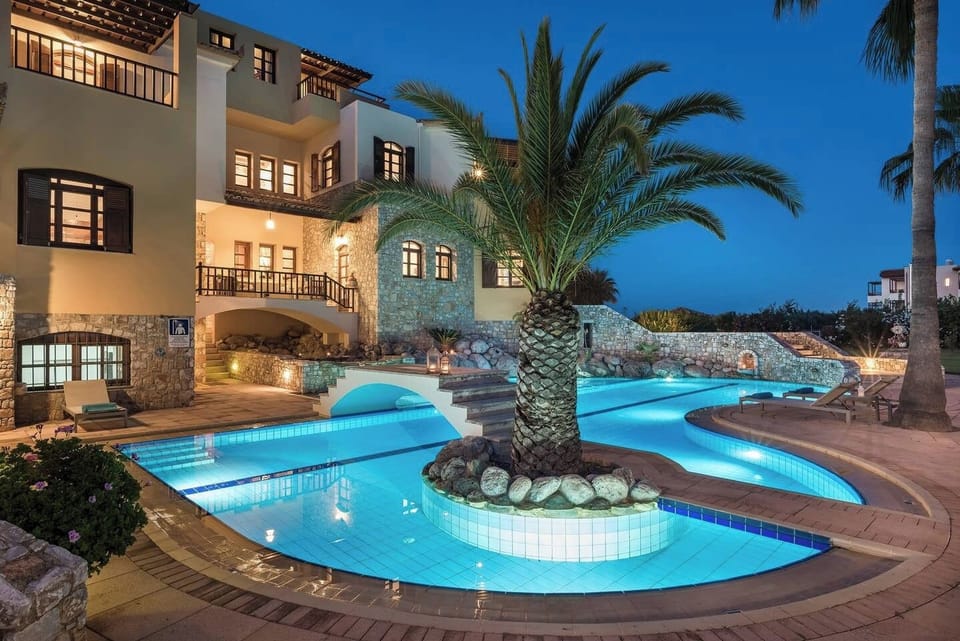 Sophisticated Poolscape Glowing Under Evening Lights